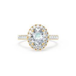 Помолвочное кольцо из желтого золота с муассанитом