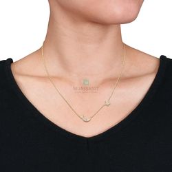 Подвеска из желтого золота с муассанитами